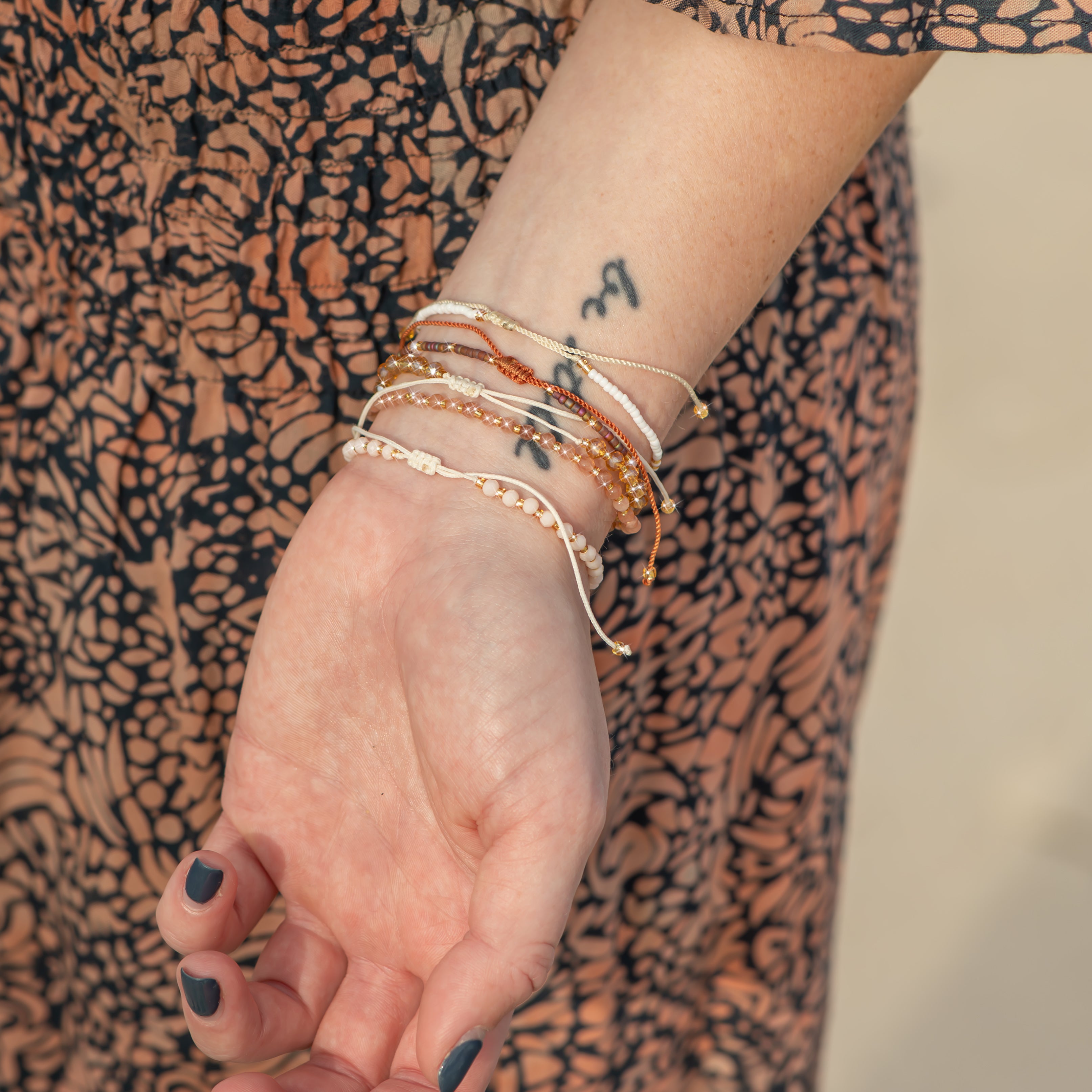 White and Gold Beaded String Bracelet