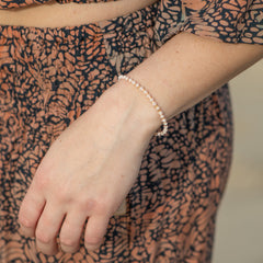 Light Pink and Gold Beaded String Bracelet